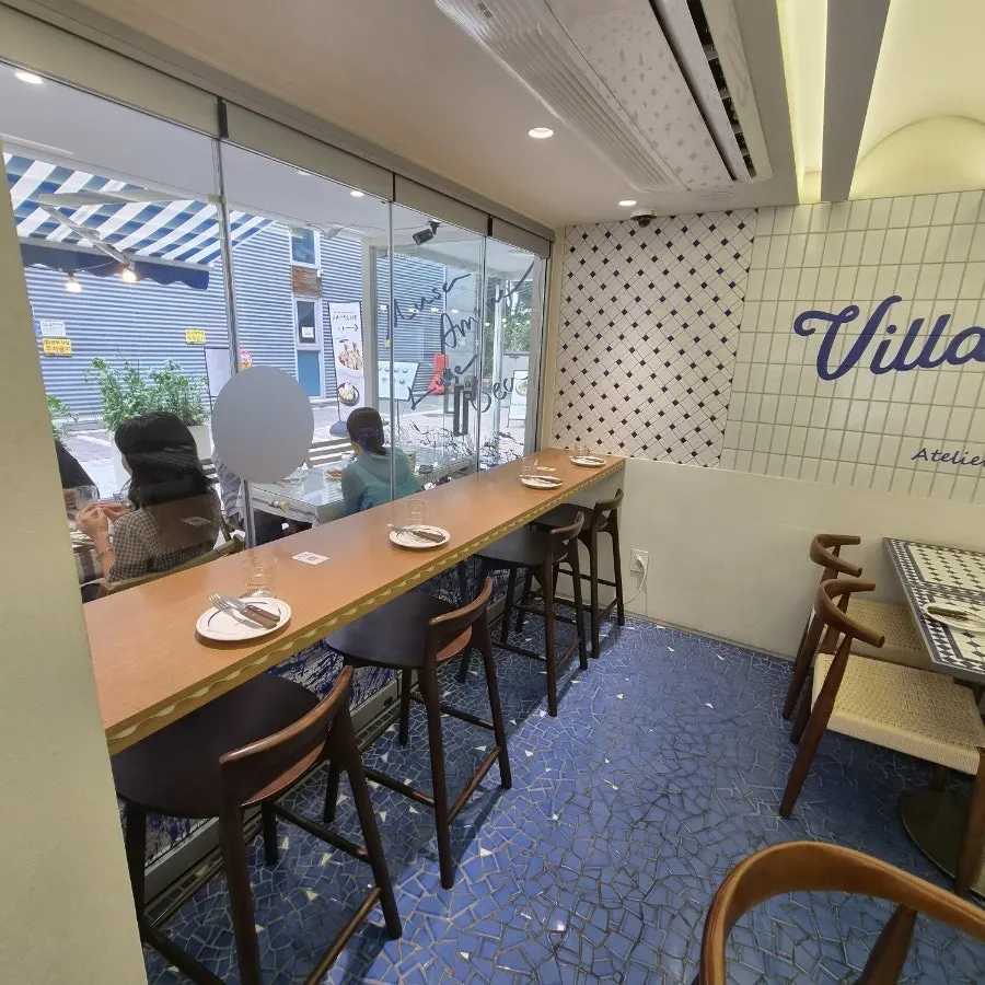 Blue and white tiled hall interior