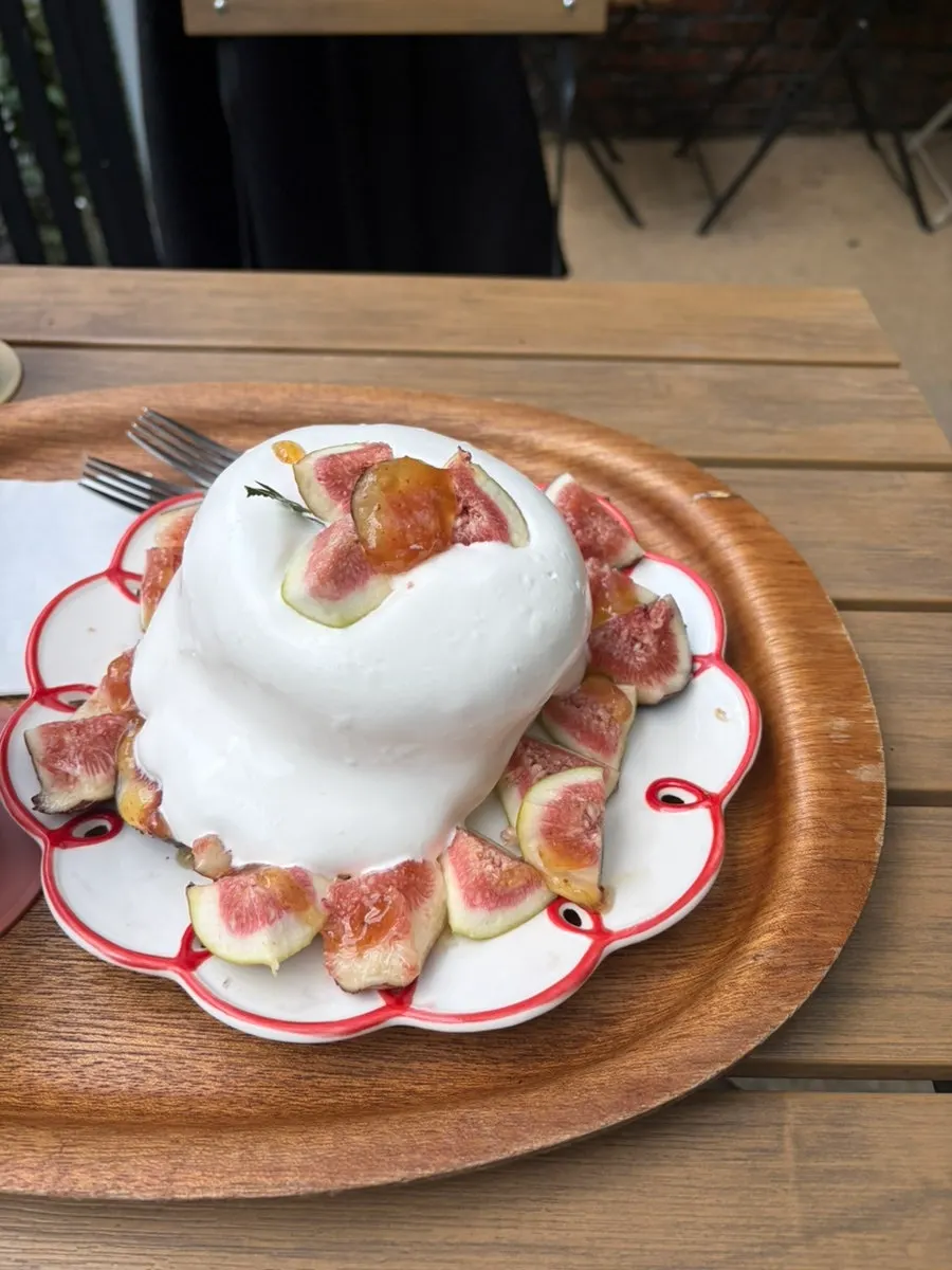 Soufflé and coffee enjoyed at a terrace table