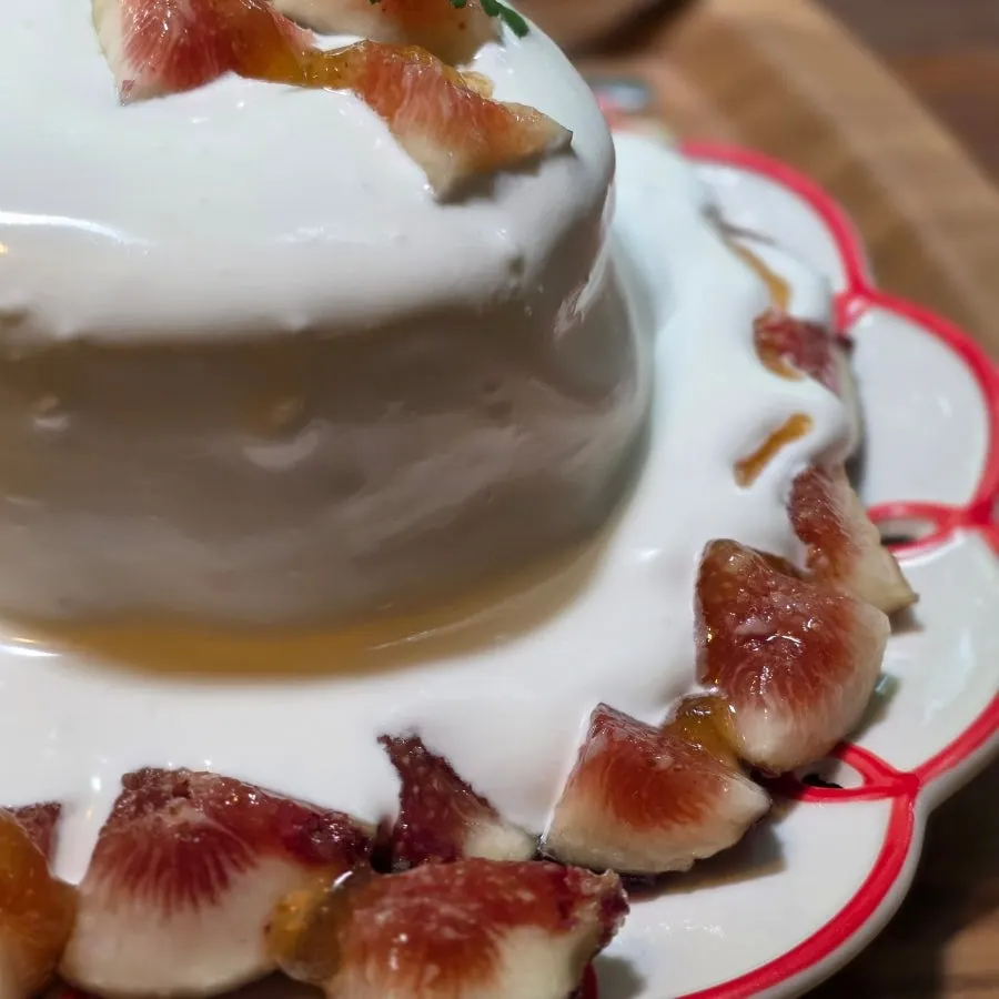 Fig soufflé cake with whipped cream