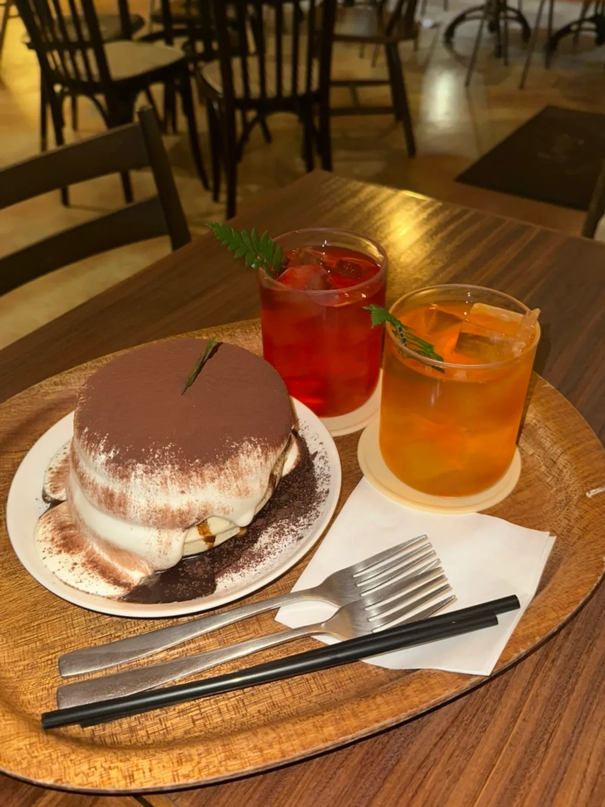Tiramisu soufflé and two cups of tea on the table