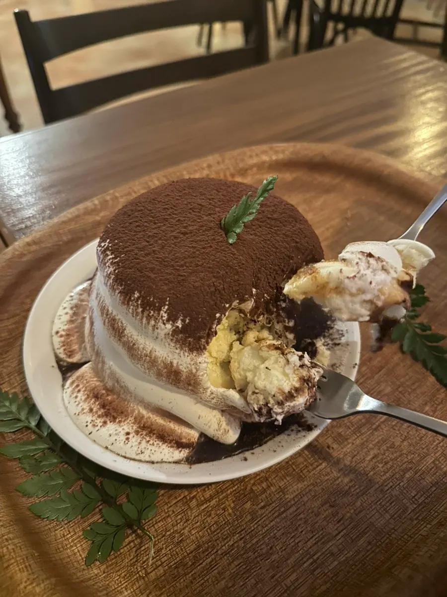 Close-up of the cream-topped tiramisu soufflé at 5to7