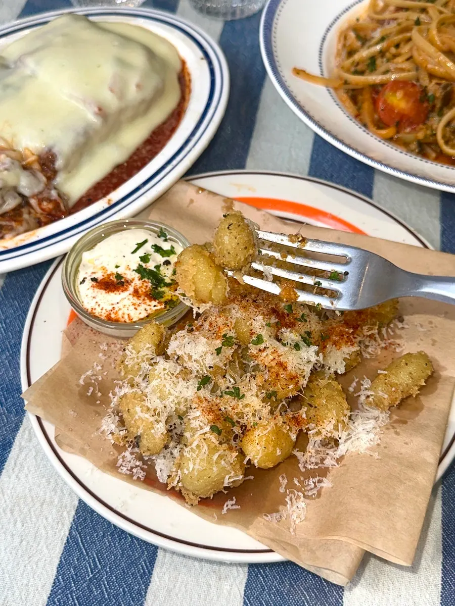 Cross-section of gnocchi fritti showing chewy interior