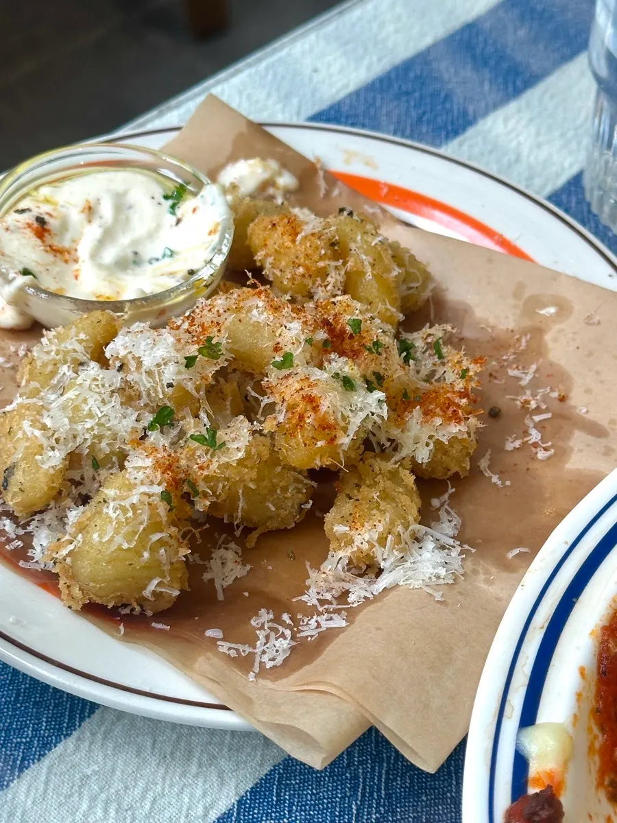 Plate of gnocchi fritti served as a side