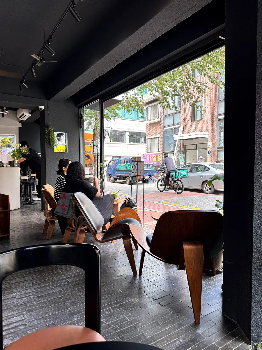 Café interior with charcoal walls and lighting
