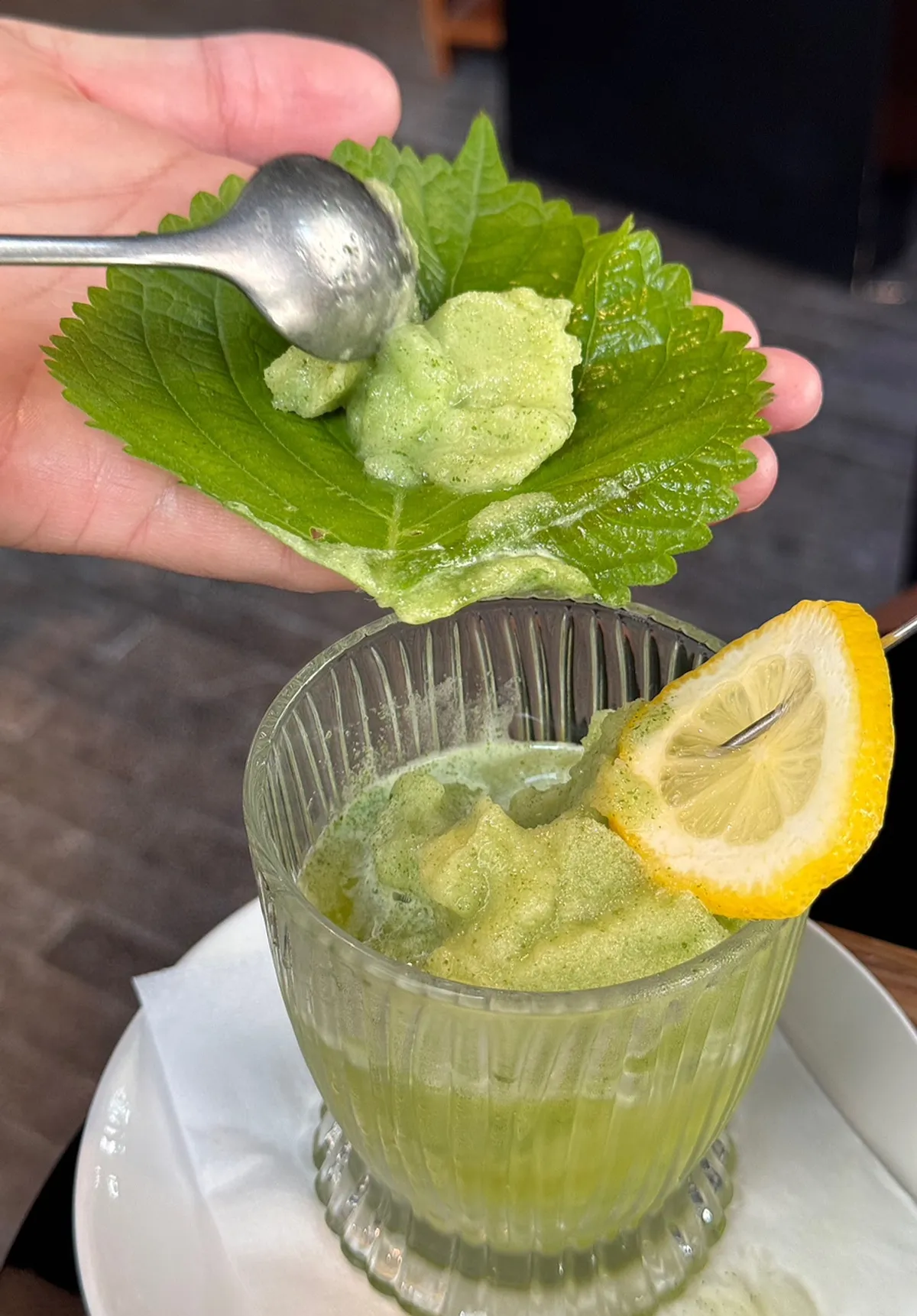 Signature drink with sherbet on a perilla leaf