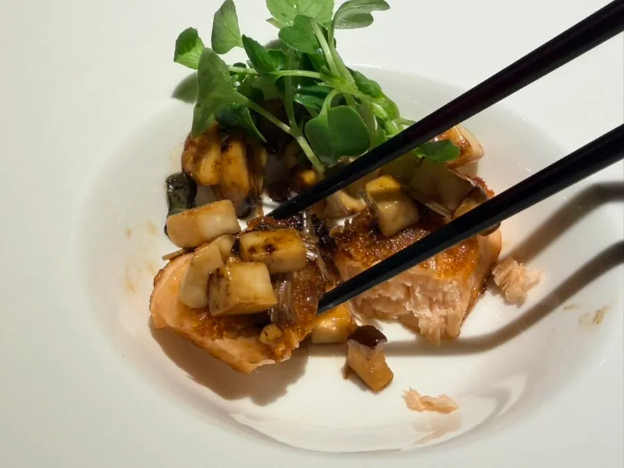 Cross-section of salmon steak with sweet-savory sauce
