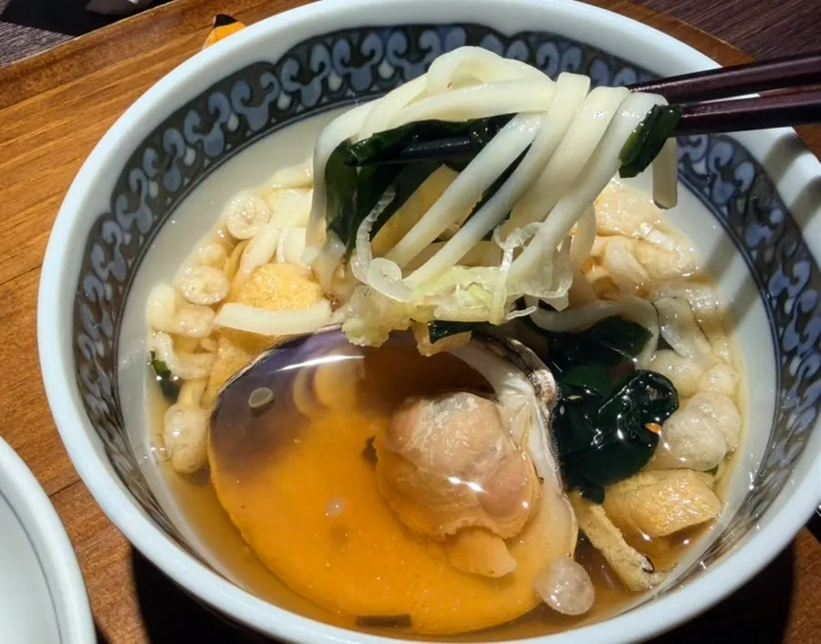 Clam udon with kelp, clams, and fried tofu