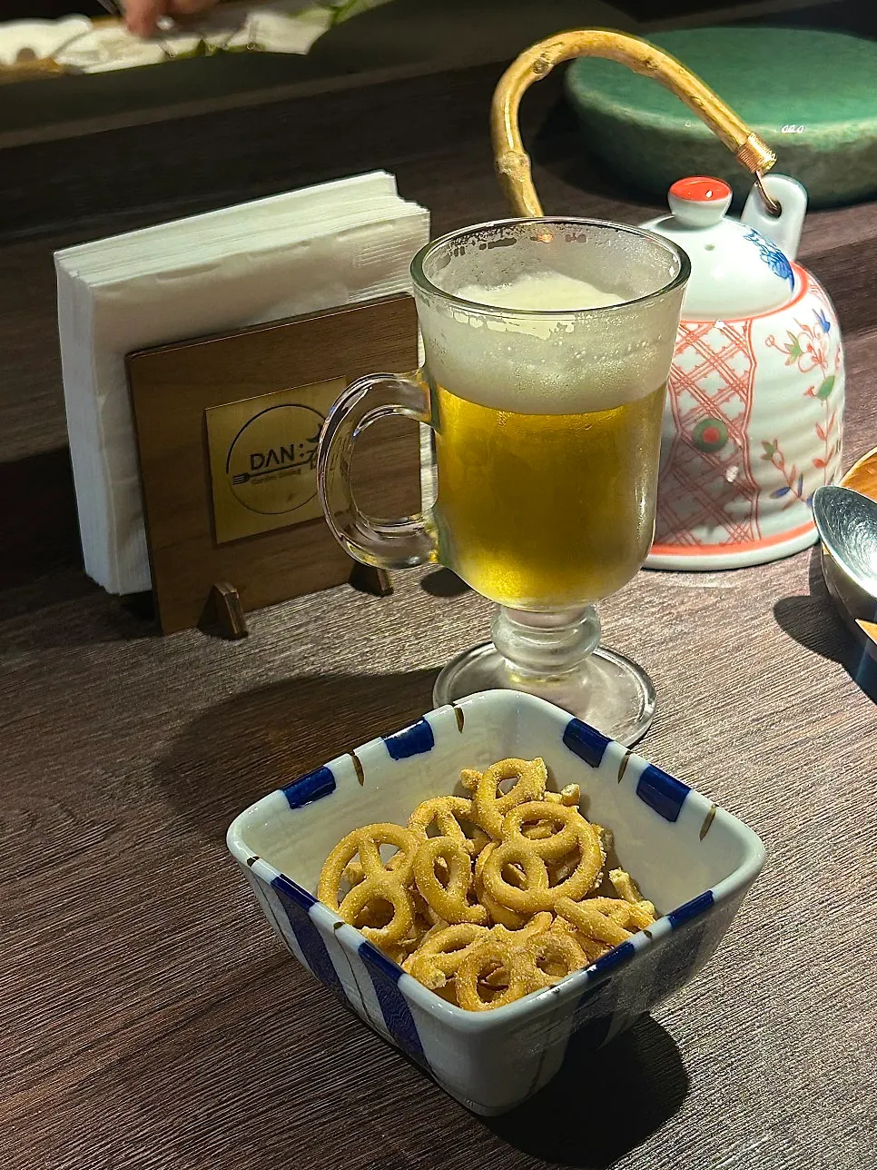 Draft beer included in the course with a wasabi pretzel snack