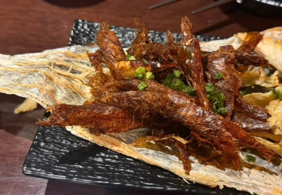Warm, crispy grilled dried pollock
