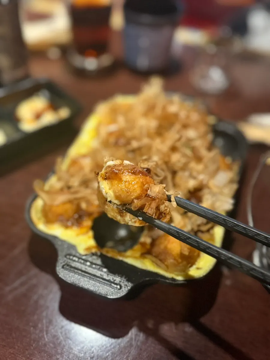 Takoyaki served with egg