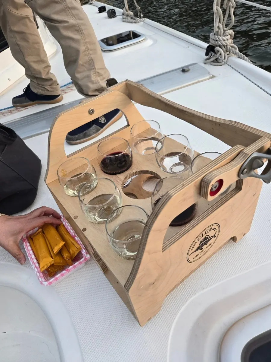 Yacht seating prepared with wine and snacks