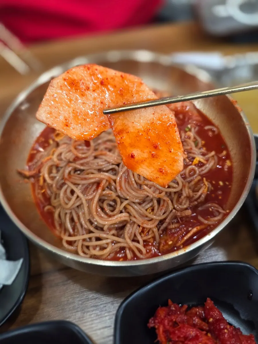Bibim naengmyeon noodles mixed with sauce