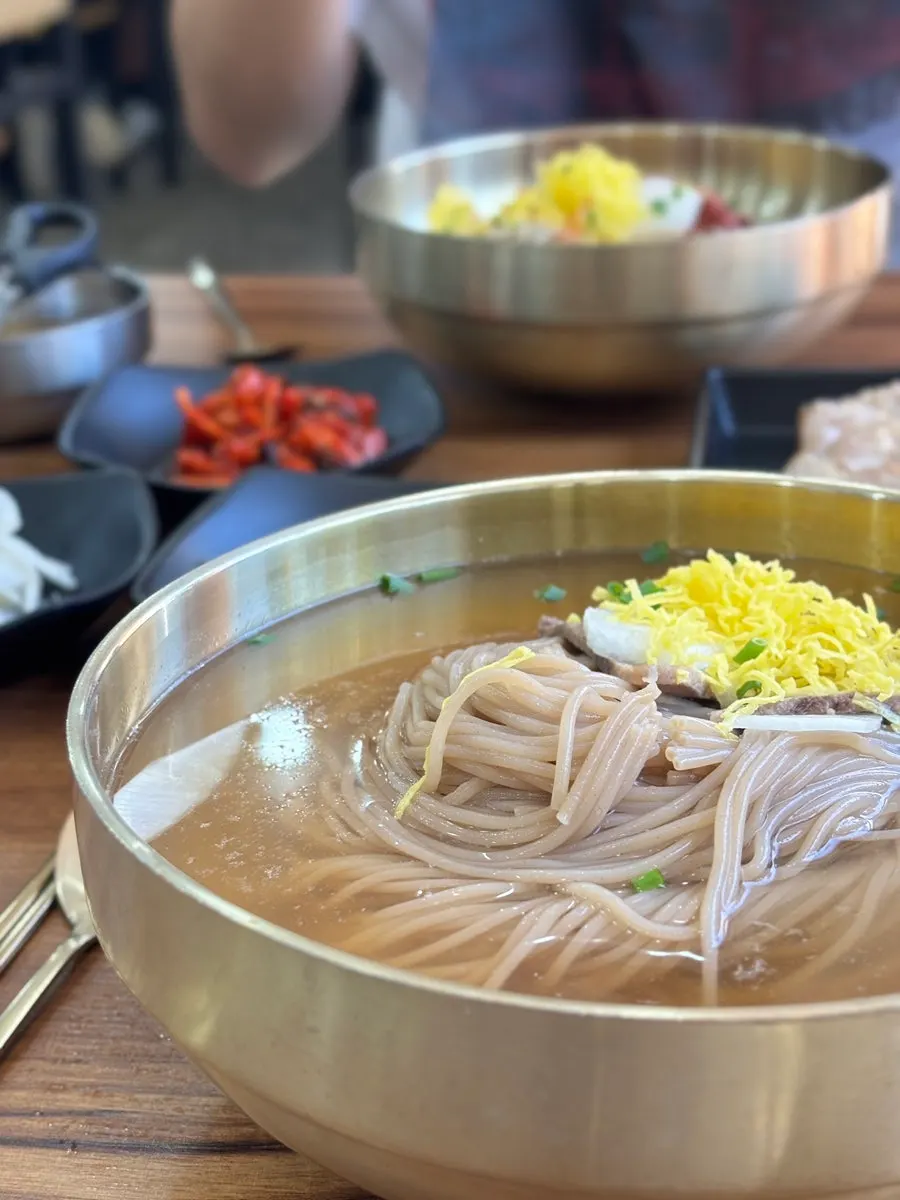 A full naengmyeon spread at Seoul Myeonok near Pyeongtaek Station