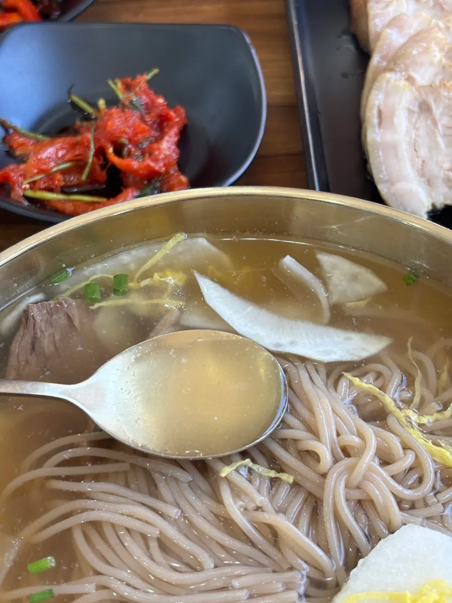 A bowl of pyongyang naengmyeon with buckwheat noodles