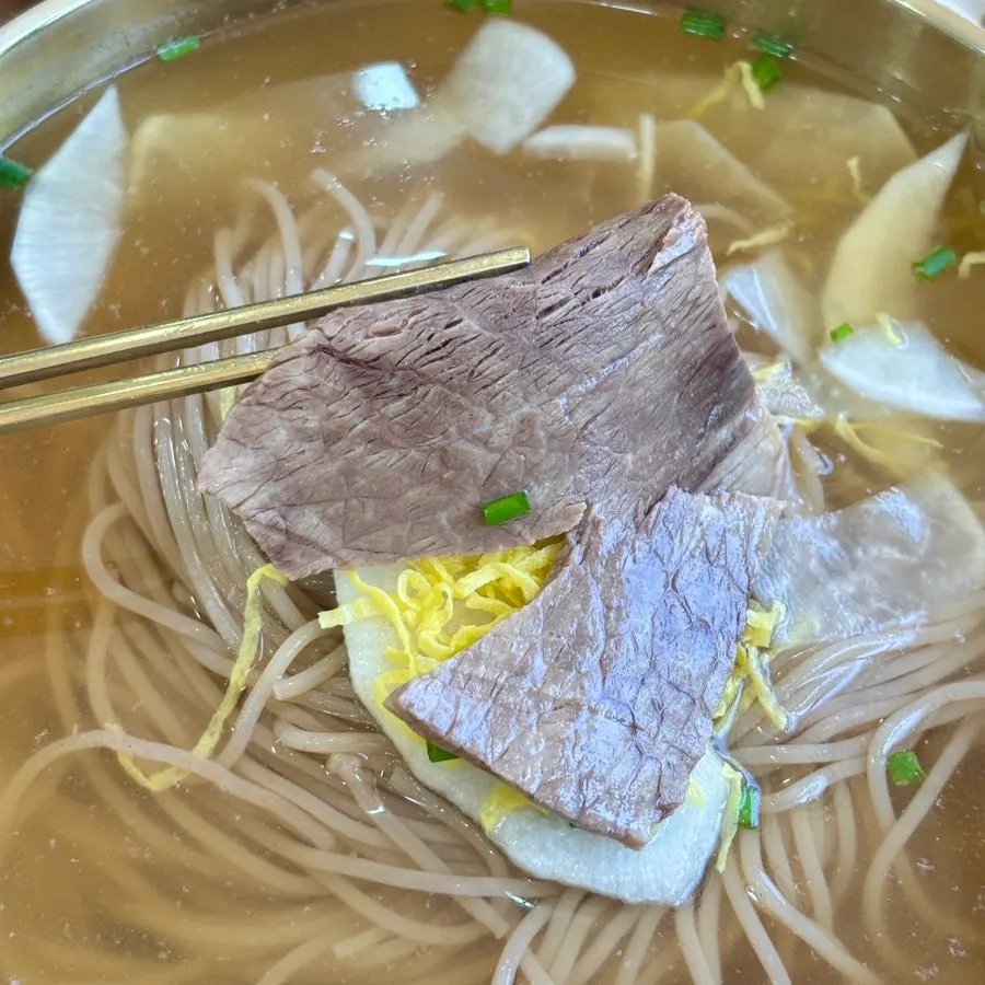 Pyongyang naengmyeon broth with vinegar added
