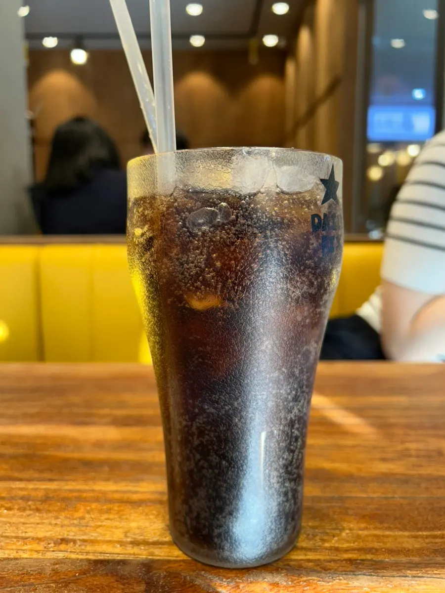 Large refillable cup of cola