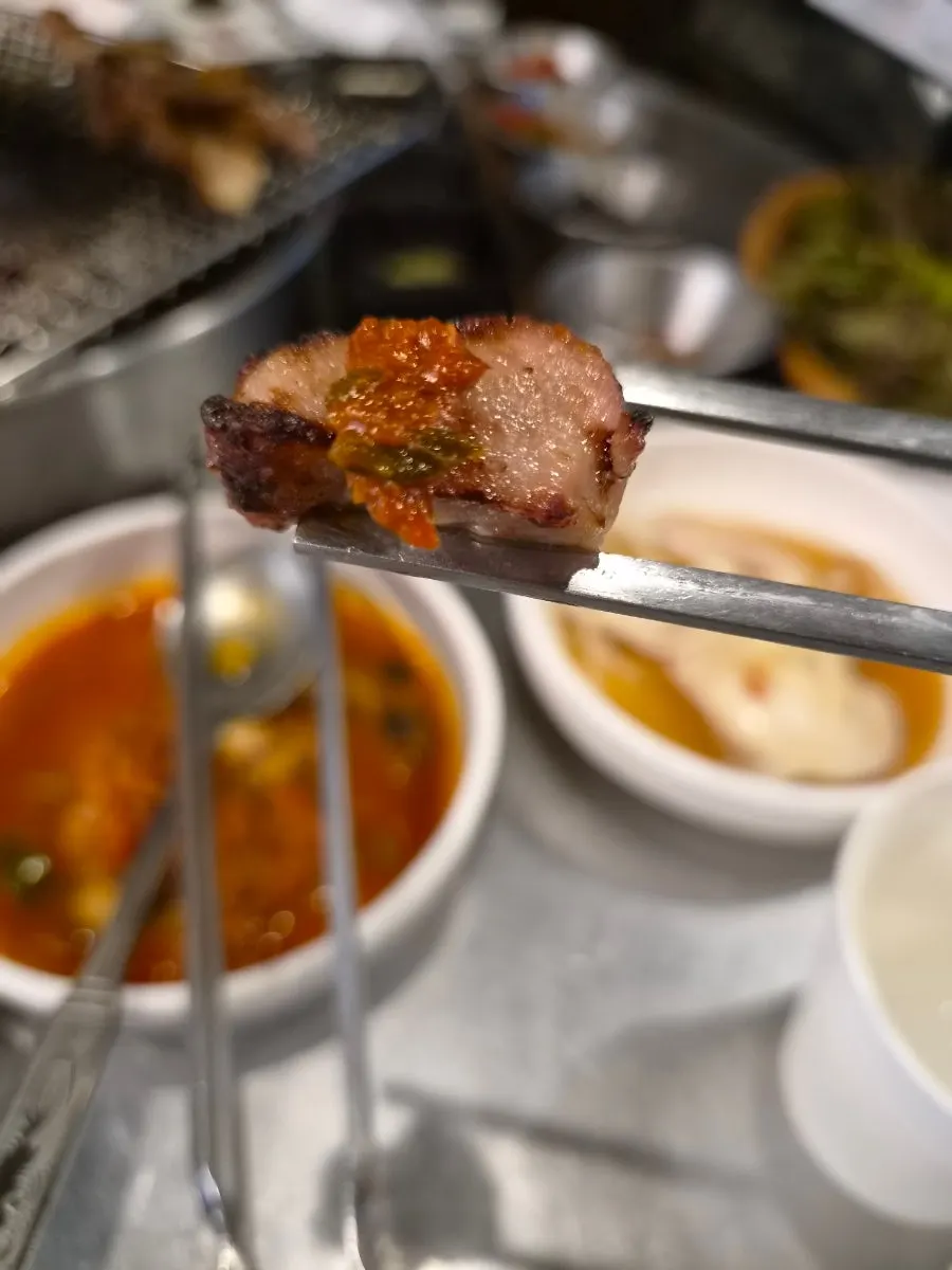 Meat served with sauce and pickles