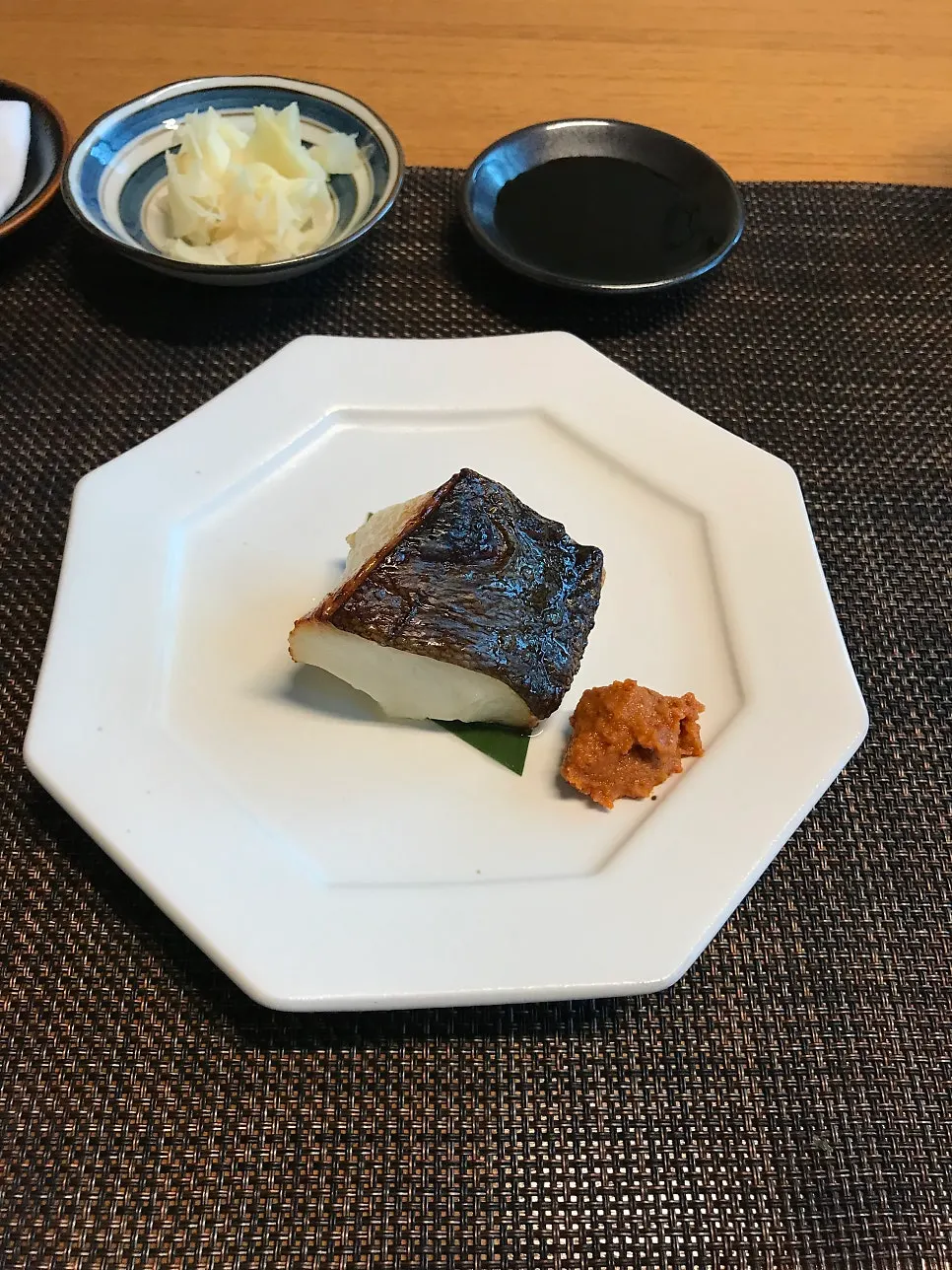 Flaked silver cod after grilling