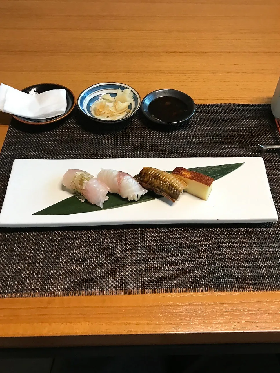 A bite of kaisendon wrapped in seaweed