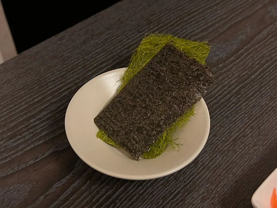 Sashimi served with gamtae and gim seaweed