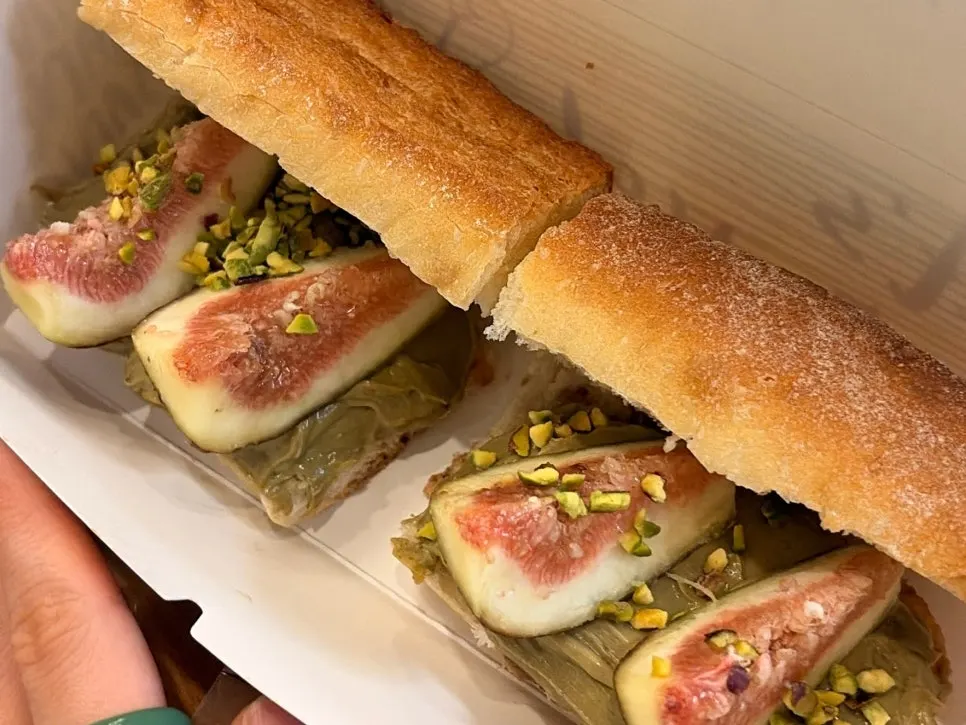 Fig pistachio baguette cut for sharing