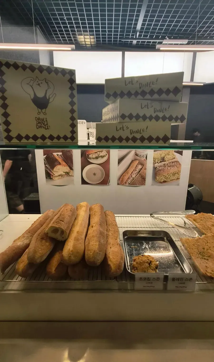 Baguettes and ciabattas lined up on display