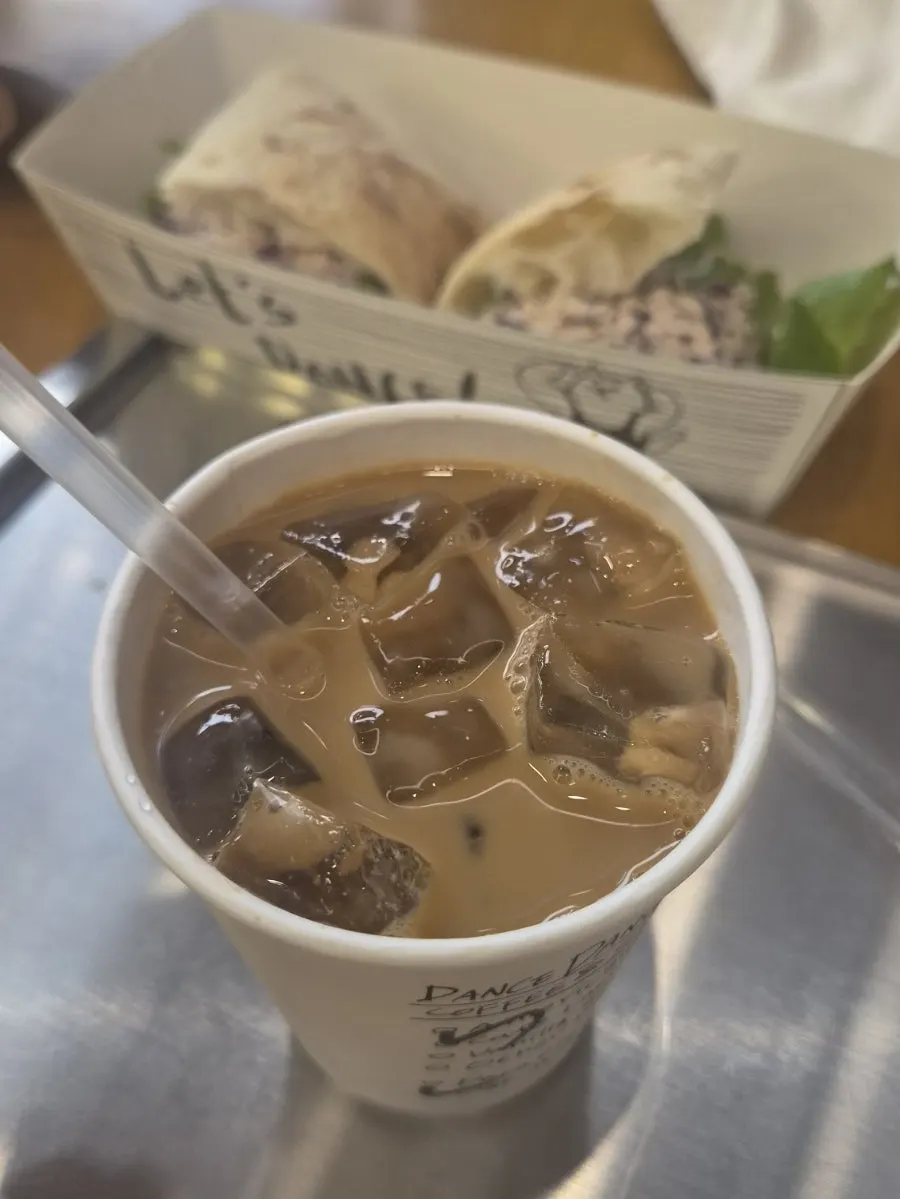 A cup of oat milk latte
