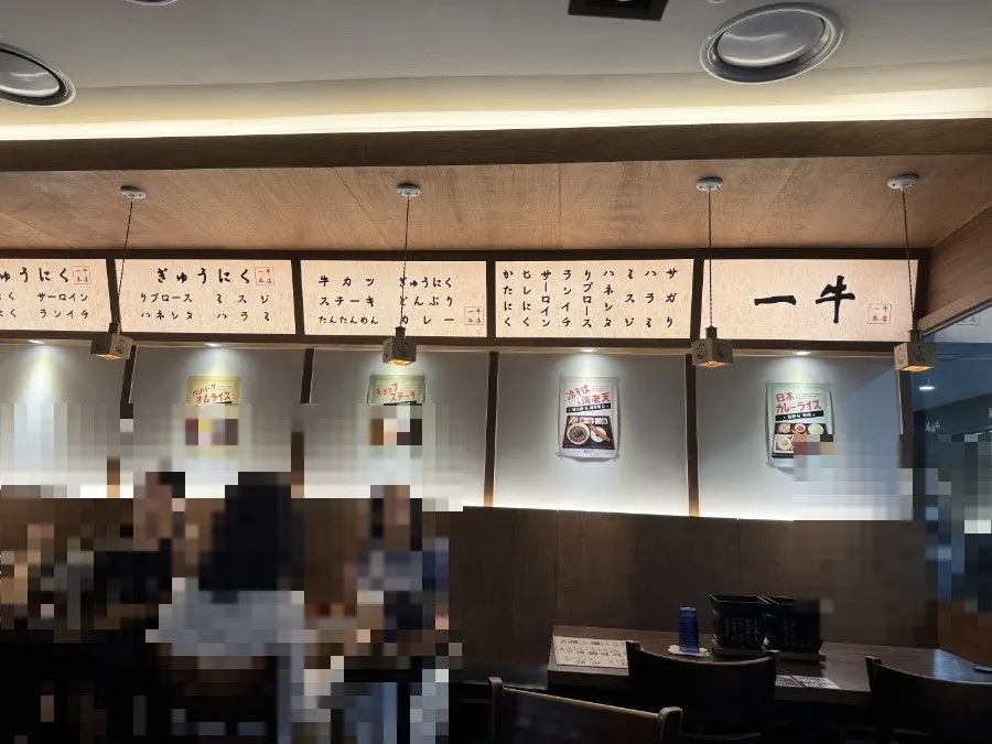 Interior of Ichigyu Seoul Station Branch with customers