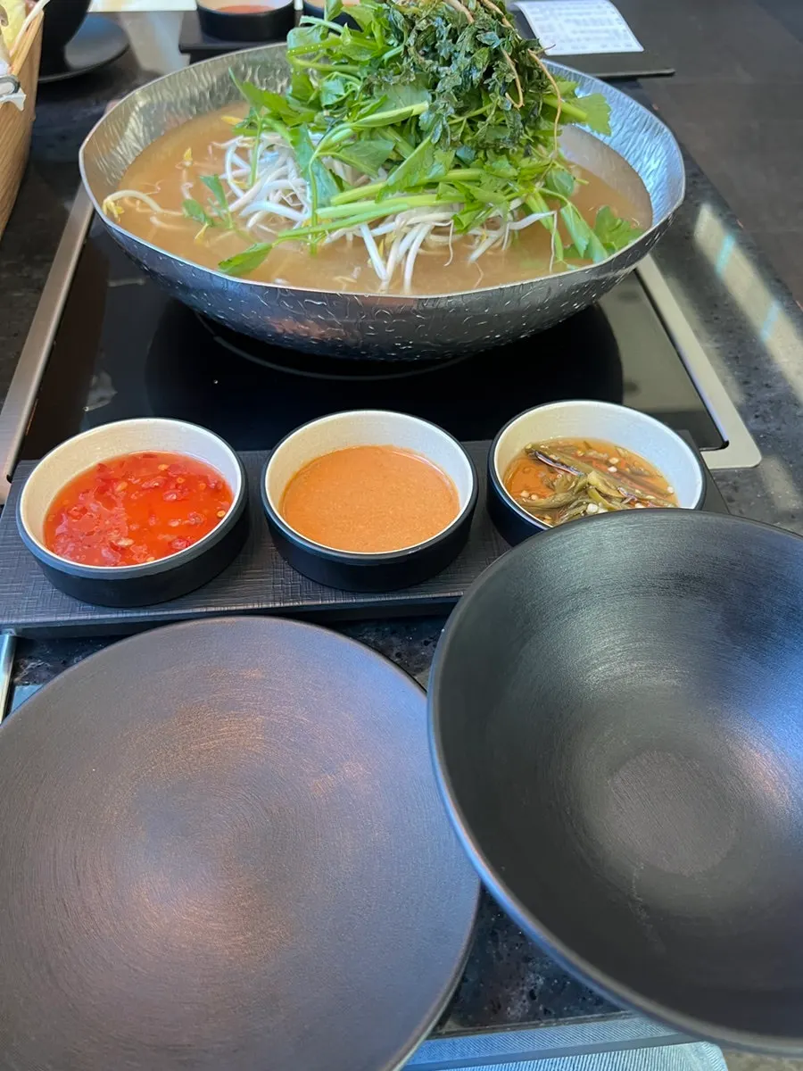 Shabu-shabu ingredients with mushrooms and vegetables