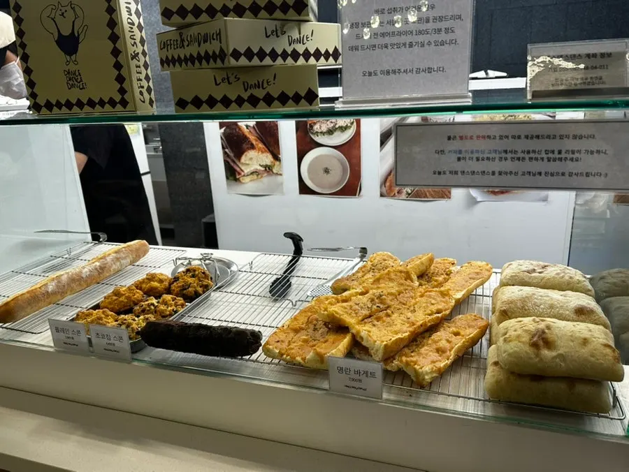 Display of baguettes, scones, and ciabatta