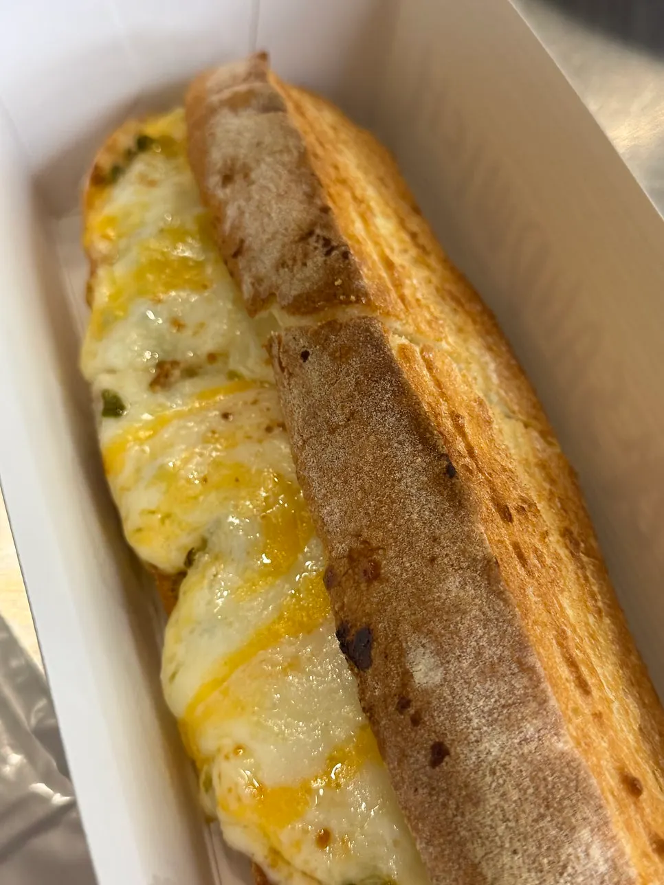Melted cheese inside the grilled cheese sandwich