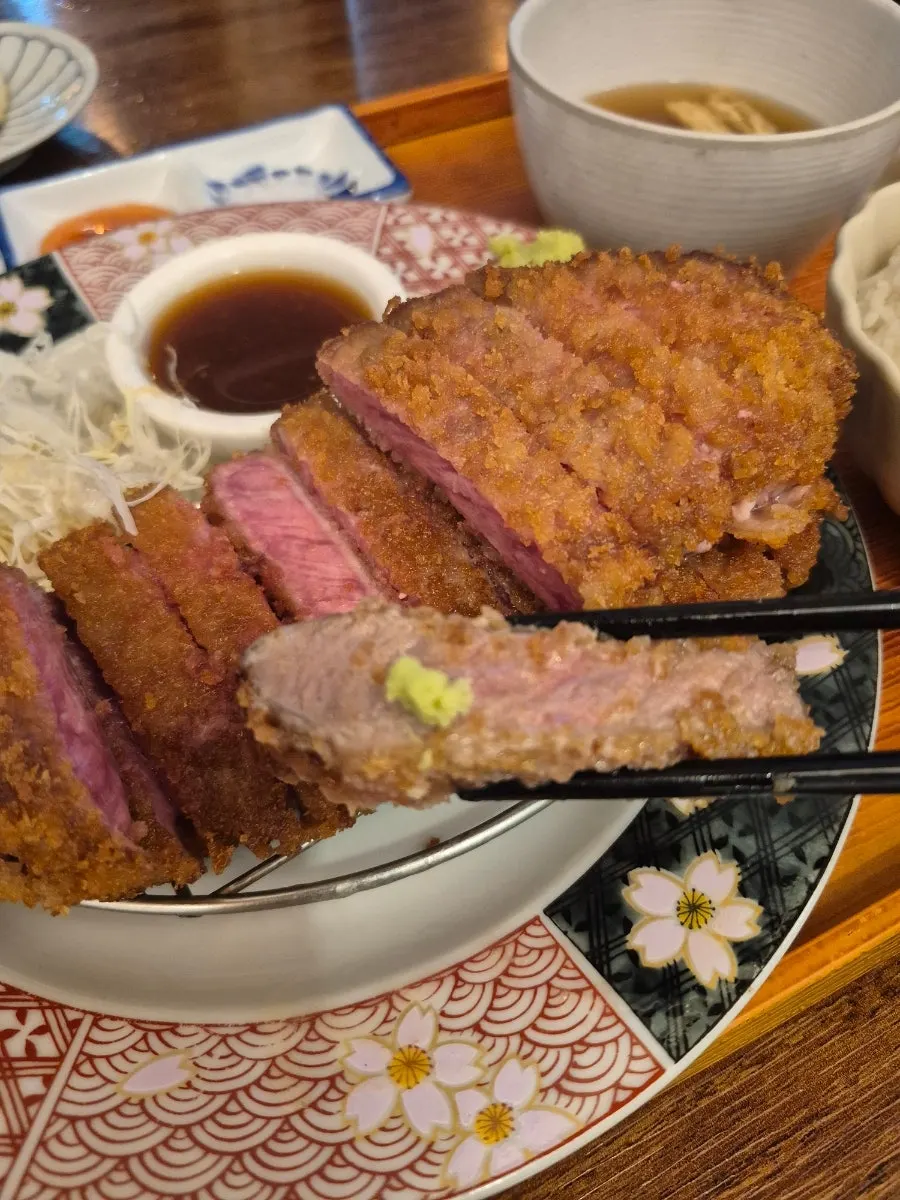 A slice of gyukatsu seared front and back