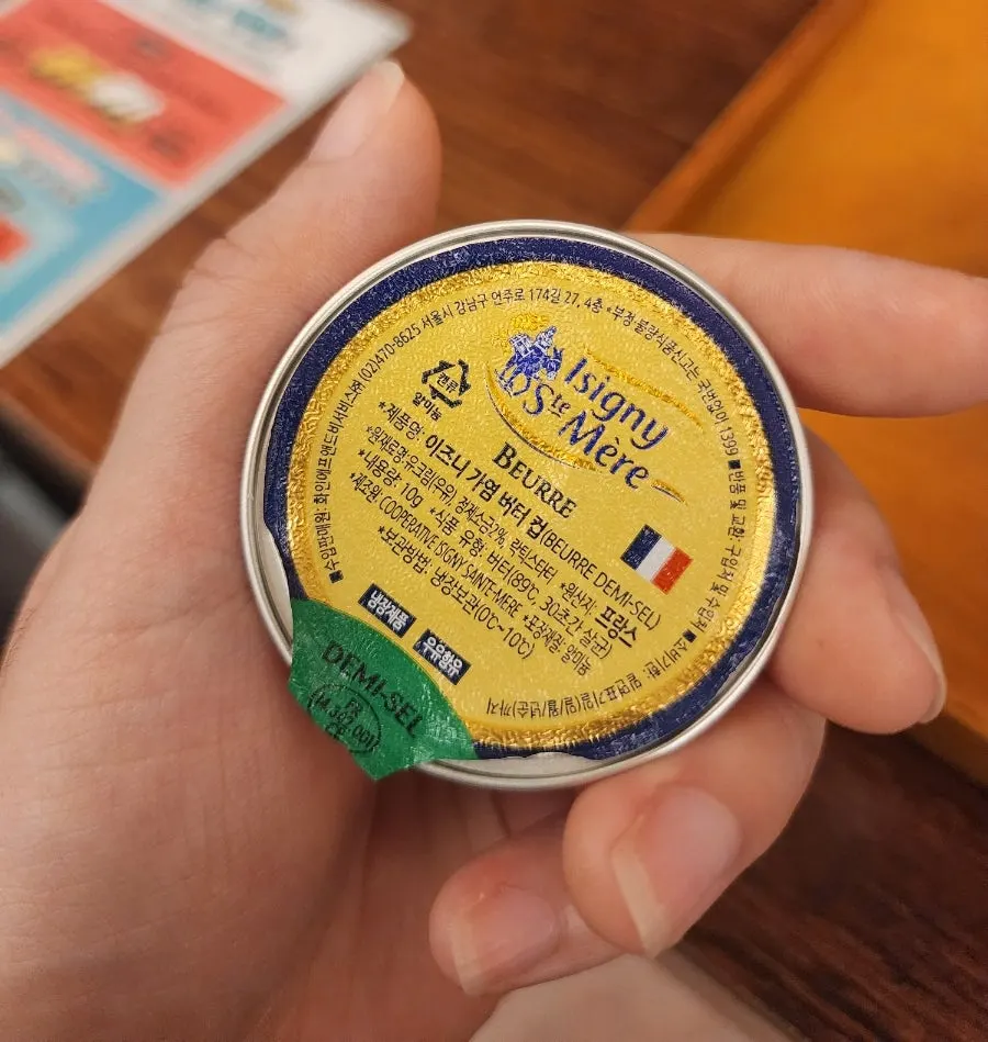 French butter melting on the tabletop grill