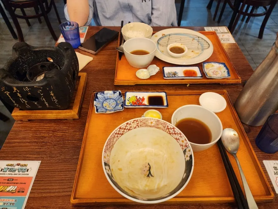 Meal spread with both gyukatsu and sutekidon