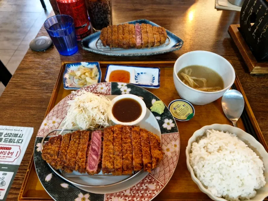 A plate of breaded sirloin gyukatsu