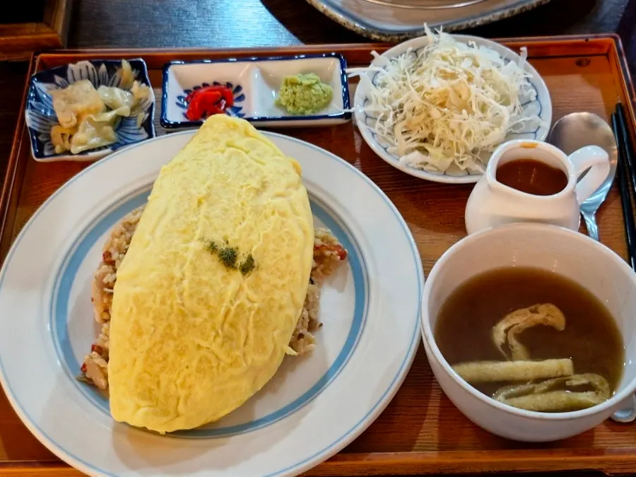 Hamburg omurice topped with demi-glace sauce