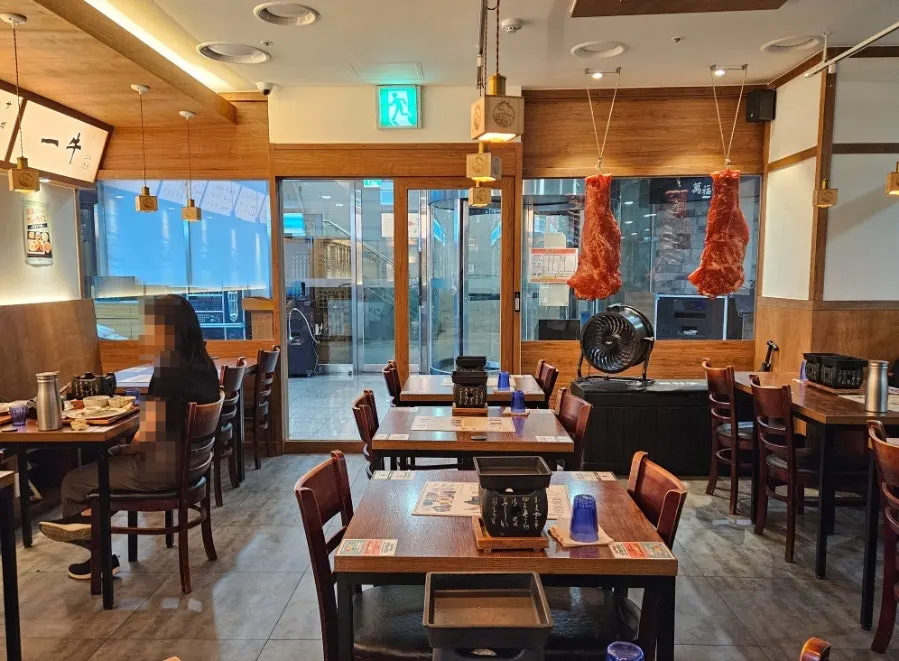 Warmly lit interior of Ichigyu Seoul Station Branch