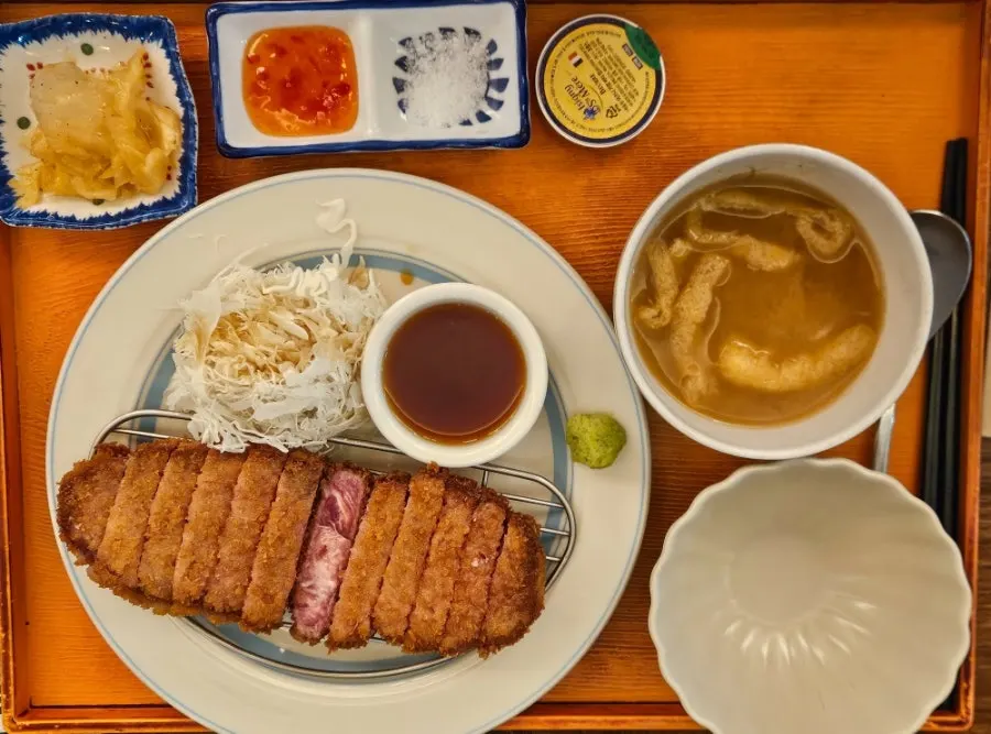 Medium-rare sirloin gyukatsu set table spread