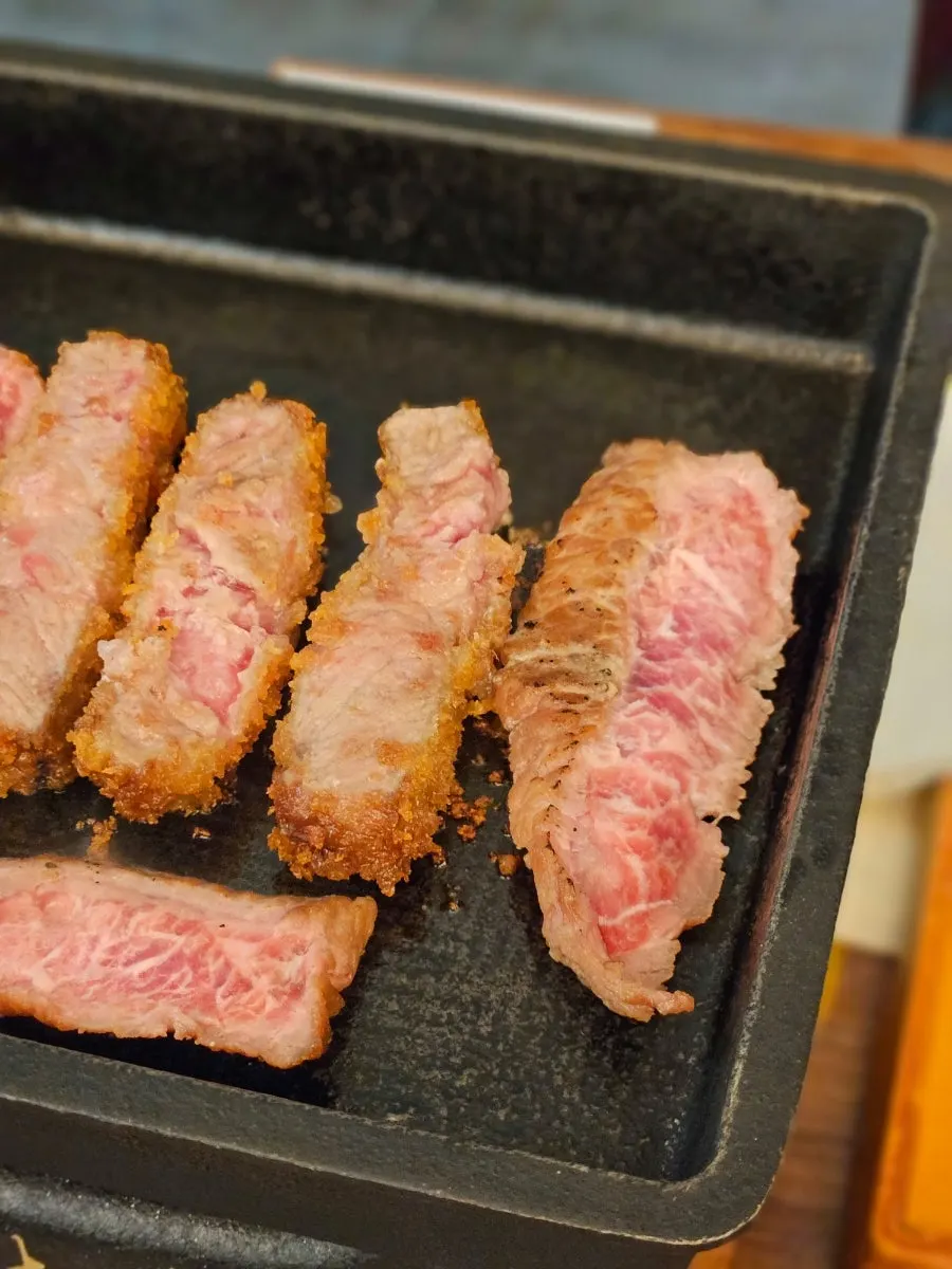 Unbreaded sirloin steki set table spread