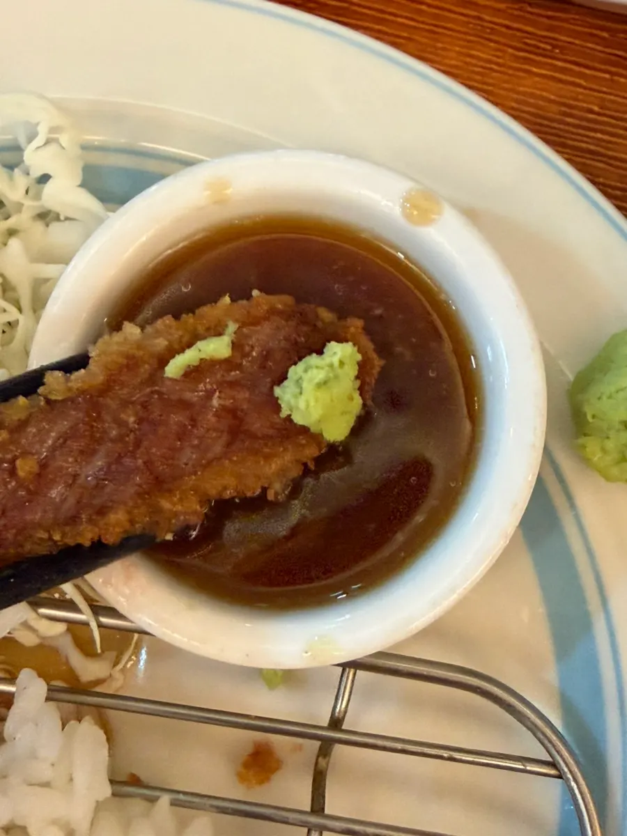 Gyukatsu topped with wasabi, dipped in special sauce