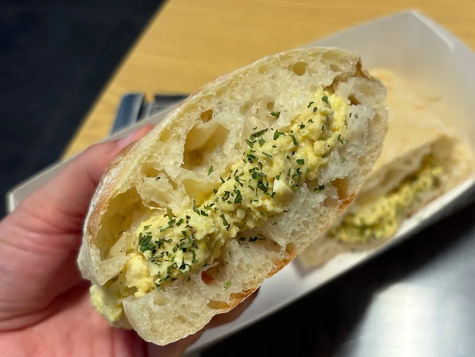 Oat milk latte paired with the sandwich for breakfast