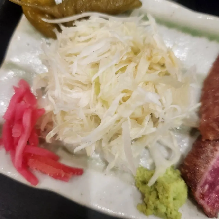 Salt and various sauces set out on the table