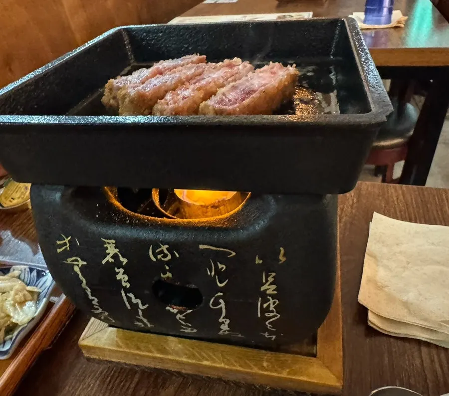 Gyukatsu dipped in soy sauce