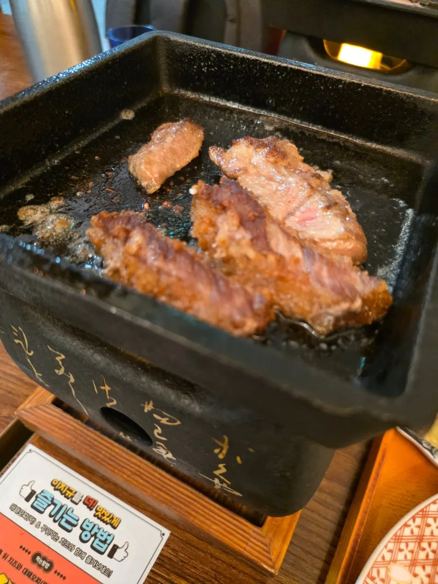 Grilling gyukatsu on the personal brazier