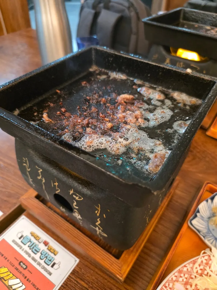 A bite of sirloin enjoyed with rice
