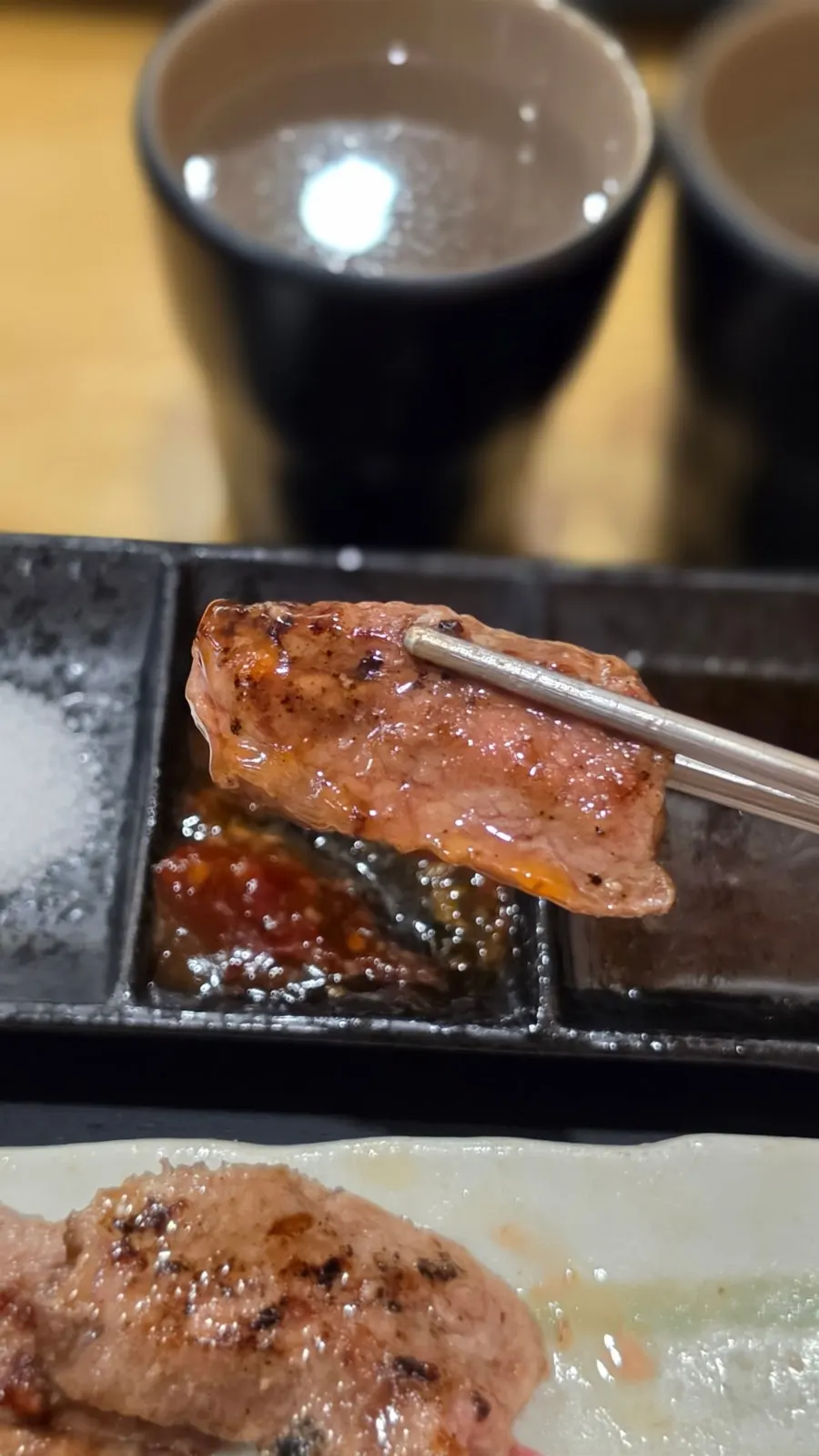 Gyukatsu placed on the grill
