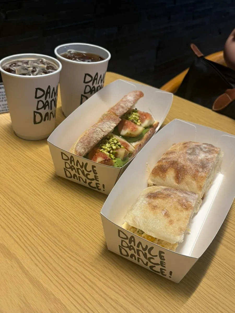 Drink menu and order counter at Dance Dance Dance