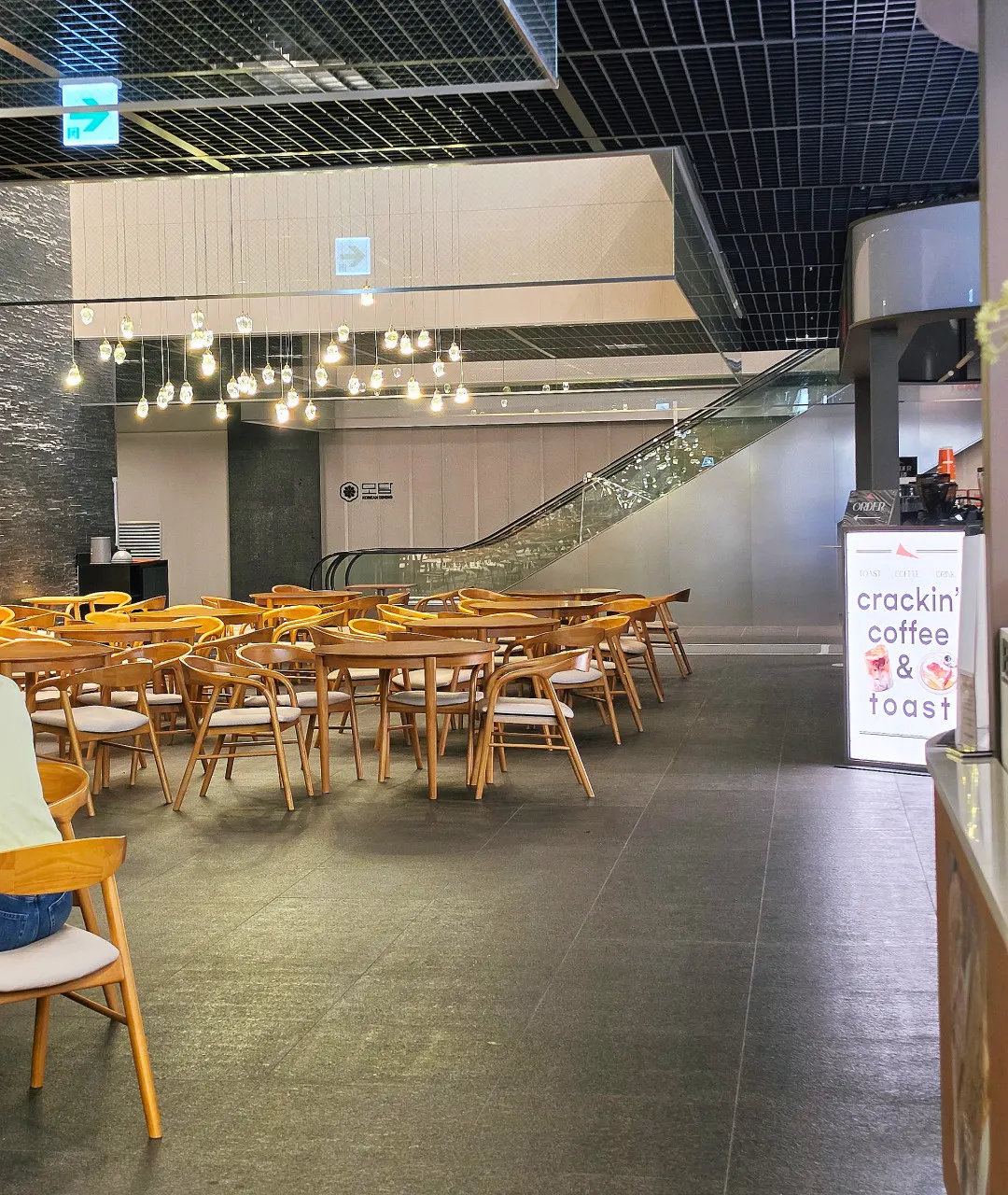 View of the spacious seating area at Dance Dance Dance Seoul Station