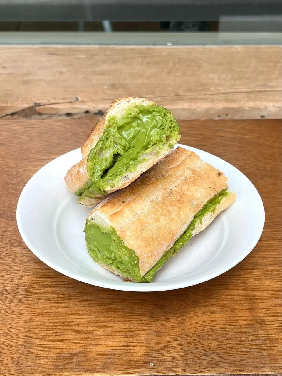 Matcha tofu cream cheese sandwich showing bright green cream
