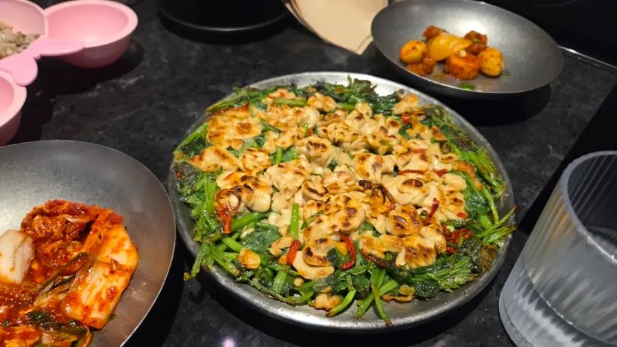 Minari goni jeon with plump pollock milt
